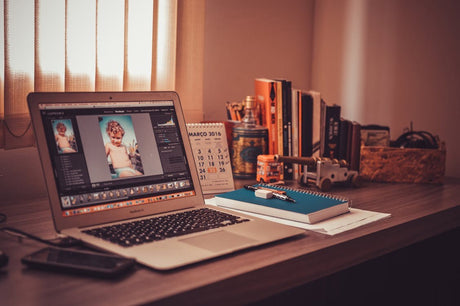 A laptop on a desk that’s running the best video editor on Mac