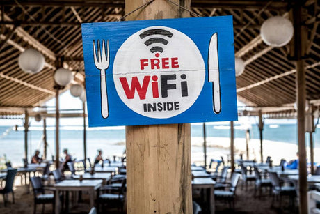 a sign declaring free wifi inside