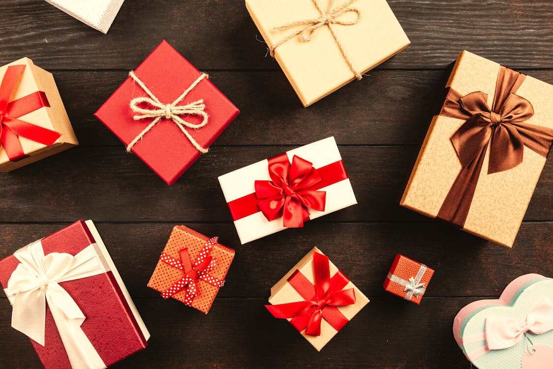A bunch of wrapped software gifts on a table
